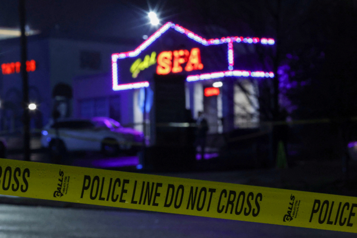 FILE PHOTO: Crime scene tape surrounds Gold spa after deadly shootings at a businesses in the Atlanta area, in Atlanta, Georgia, U.S. March 16, 2021. REUTERS/Chris Aluka Berry/File Photo

