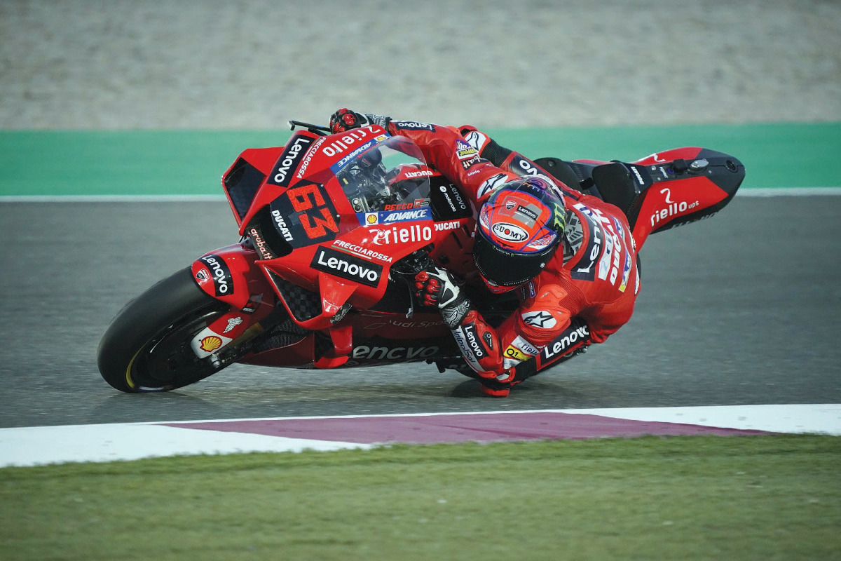 Francesco Bagnaia in action during qualifying for Barwa Grand Prix of Qatar at Losail International Circuit, yesterday. DOWN: Bagnaia gestures during the qualifying stage.  