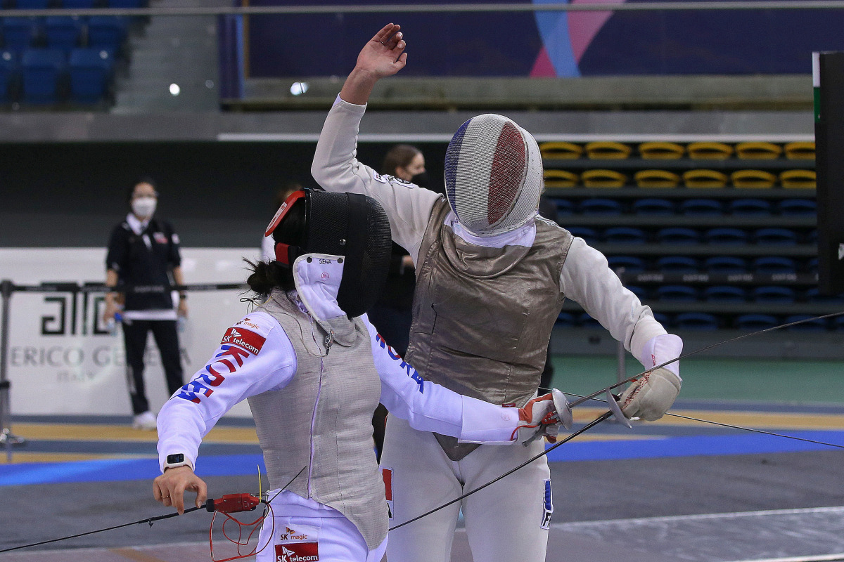 Fencers are seen in action on day two of the International Fencing Federation (FIE) Foil Grand Prix Doha 2021 at the Aspire Dome in Doha yesterday. More than 260 fencers from 51 countries are competing for points that help towards qualification for the To
