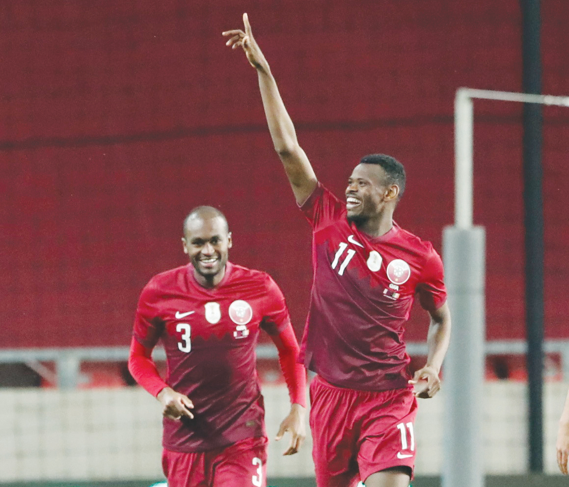 Qatar’s Mohammed Muntari celebrates with team-mate Abdelkarim Hassan after scoring their first goal against Ireland at Nagyerdei Stadion in Debrecen, Hungary, yesterday.