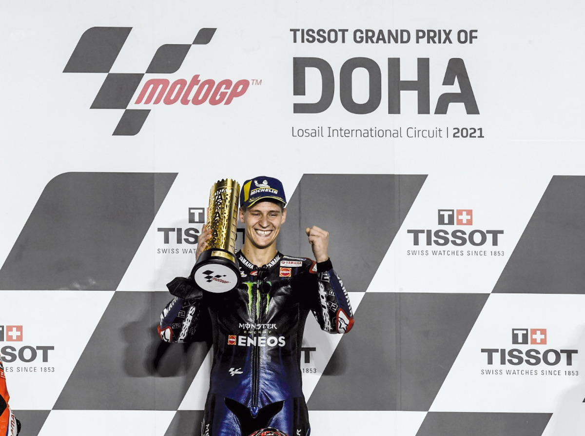 French rider Fabio Quartararo of Monster Energy Yamaha MotoGP celebrates on the podium after winning the Tissot Grand Prix of Doha, yesterday.