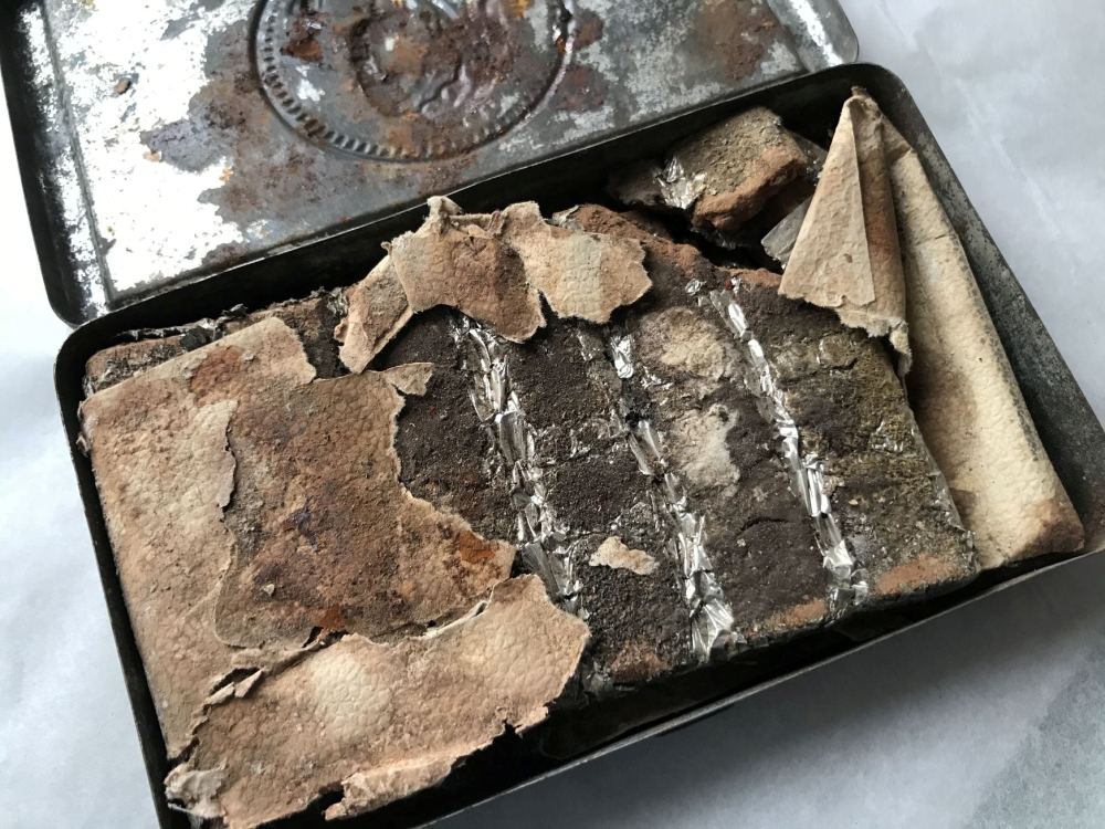 A 121-year-old chocolate bar from a batch commissioned by Queen Victoria for British troops fighting in South Africa is seen in an undated photo at Oxburgh Hall, a manor house in Norfolk, Britain where it was found in the attic. National Trust/Victoria Mc