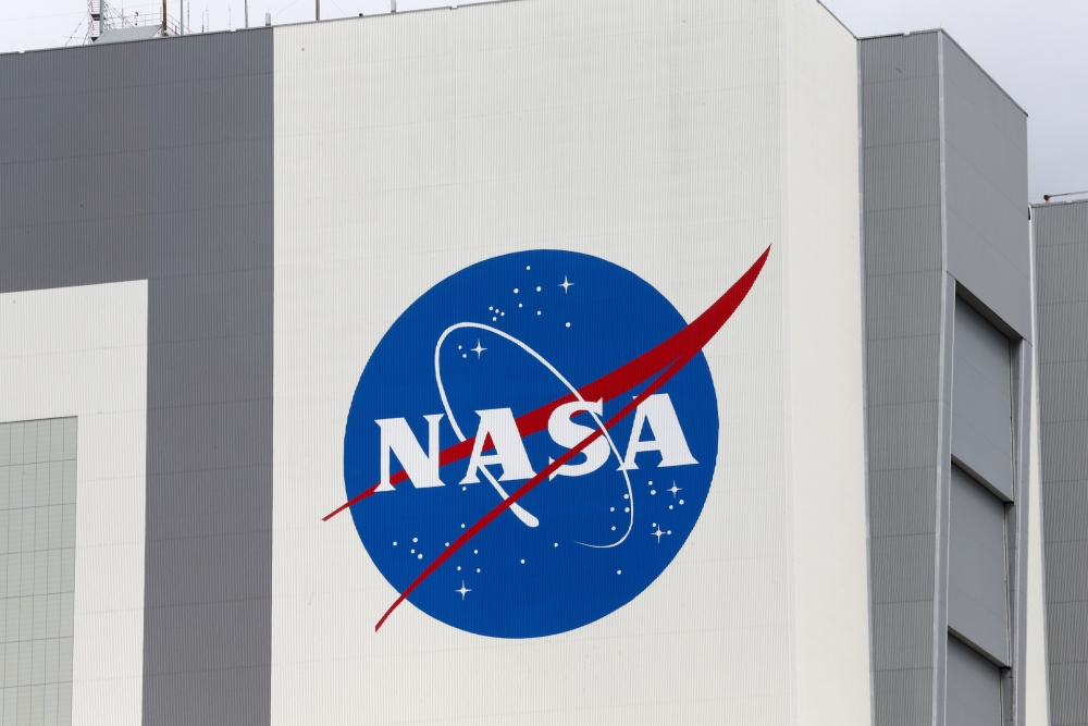 The NASA logo is seen at Kennedy Space Center ahead of the NASA/SpaceX launch of a commercial crew mission to the International Space Station in Cape Canaveral, Florida, US, April 16, 2021. Reuters/Joe Skipper