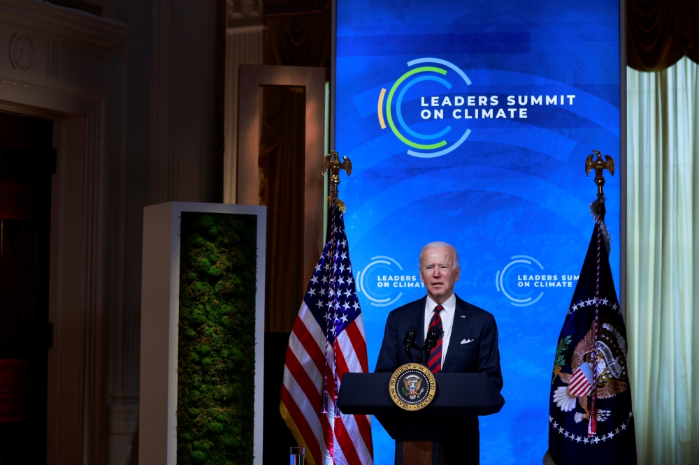 US President Joe Biden participates in a virtual Climate Summit with world leaders in the East Room at the White House in Washington, U.S., April 22, 2021. Reuters/Tom Brenner