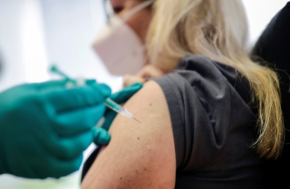 File photo of a person being vaccinated. 