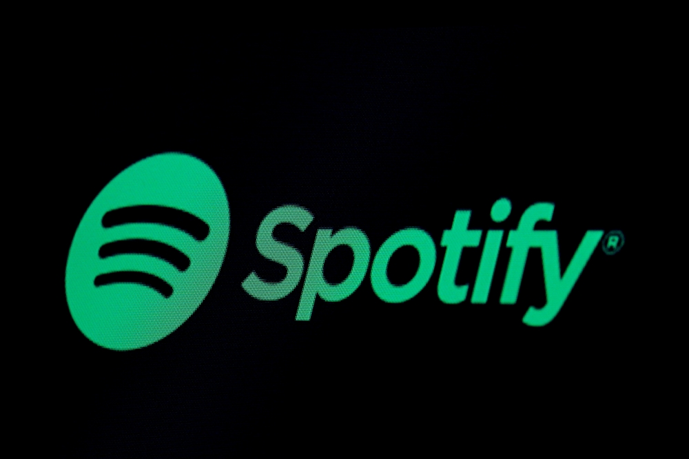 The Spotify logo is displayed on a screen on the floor of the New York Stock Exchange (NYSE) in New York, U.S., May 3, 2018. REUTERS/Brendan McDermid/File Photo