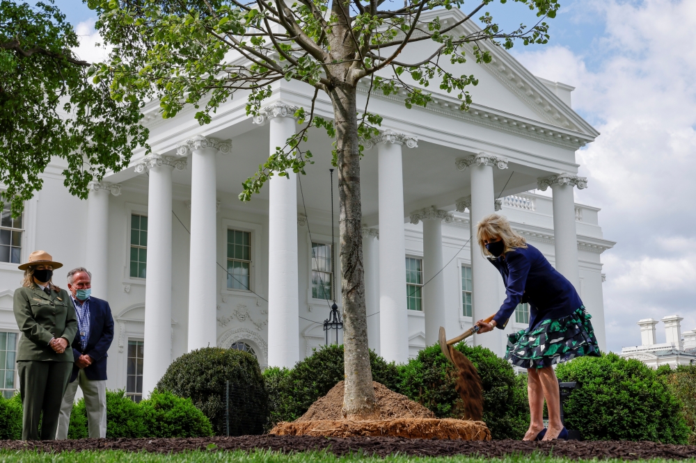 U.S. first lady Jill Biden participates in a ceremony to plant a linden tree, replacing a tree removed because of old age and disease, on the north Lawn of the White House in Washington, U.S. April 30, 2021. REUTERS/Jonathan Ernst