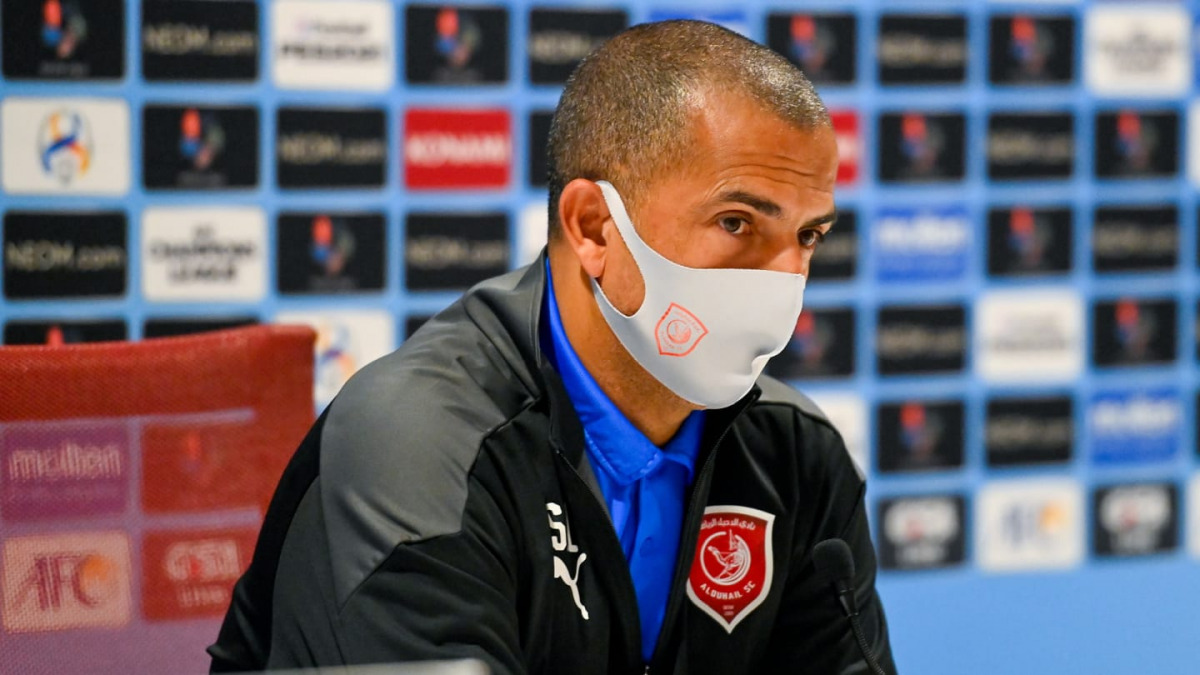Al Duhail coach
Sabri Lamouchi
speaks during a
post-match press
conference.