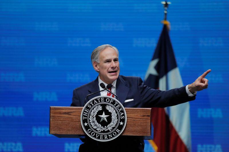 FILE PHOTO: Texas Governor Greg Abbott speaks at the annual National Rifle Association (NRA) convention in Dallas, Texas, U.S., May 4, 2018. REUTERS/Lucas Jackson
