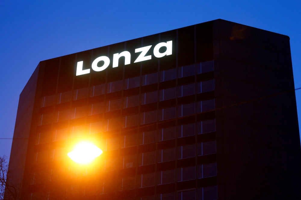 The logo of Swiss pharmaceutical group Lonza is seen at its headquarters in Basel, Switzerland March 2, 2020. REUTERS/Arnd Wiegmann/File Photo