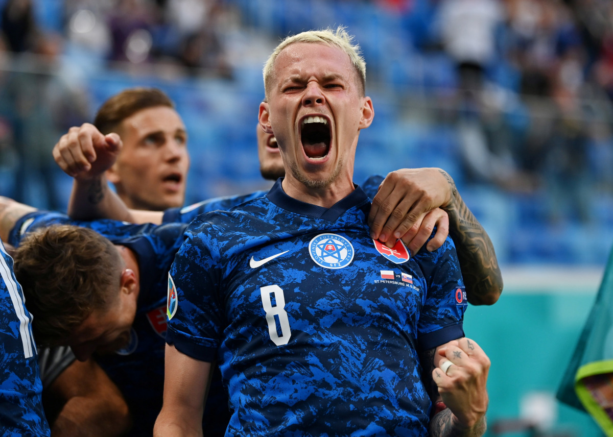 Soccer Football - Euro 2020 - Group E - Poland v Slovakia - Saint Petersburg Stadium, Saint Petersburg, Russia- June 14, 2021 Slovakia's Ondrej Duda celebrates after Milan Skriniar scored their second goal Pool via REUTERS/Kirill Kudryavtsev TPX IMAGES OF