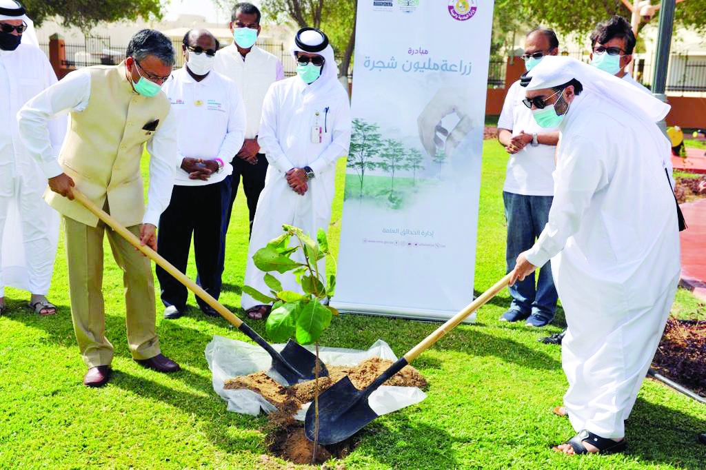 Ambassador of India to Qatar, Dr. Deepak Mittal, and Assistant Director of Public Parks Department, Mohammed Ibrahim Al Saada, during a tree-planting event at Al Mamoura Park.