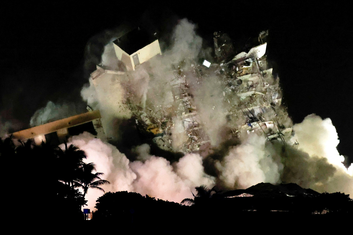 The partially collapsed Champlain Towers South residential building is demolished in SURFSIDE, Florida, U.S., July 4, 2021. Picture taken July 4, 2021. REUTERS/Marco Bello
