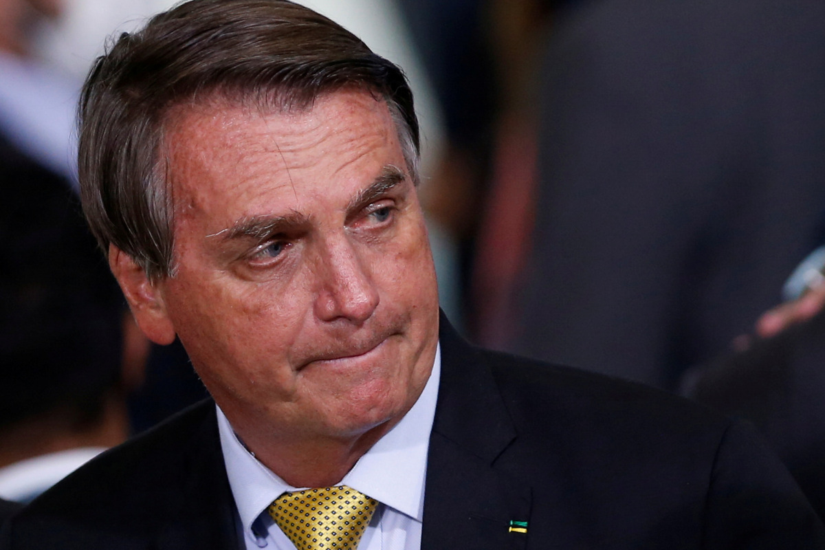 FILE PHOTO: Brazil's President Jair Bolsonaro looks on during a ceremony at the Planalto Palace in Brasilia, Brazil, June 29, 2021. REUTERS/Adriano Machado/File Photo
