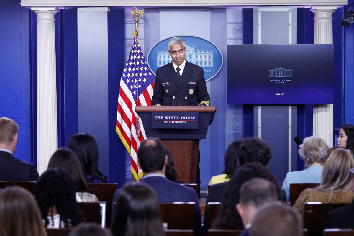 United States Surgeon General Vivek Murthy delivers remarks during a news conference with White House Press Secretary Jen Psaki at the White House in Washington, U.S., July 15, 2021. REUTERS/Tom Brenner
