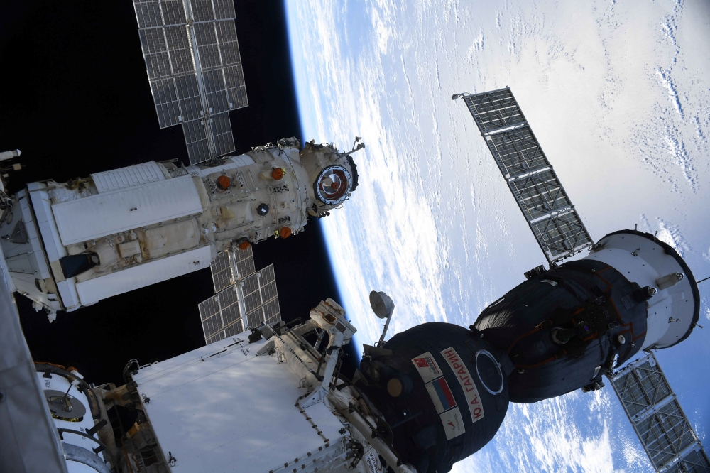 The Nauka (Science) Multipurpose Laboratory Module is seen docked to the International Space Station (ISS) next to Soyuz MS-18 spacecraft on July 29, 2021. Picture taken July 29, 2021. Oleg Novitskiy/Roscosmos/Handout via REUTERS