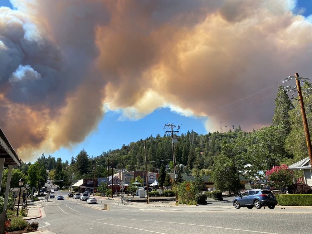 Smoke billows from the River Fire in Colfax, California, U.S., August 4, 2021, in this picture obtained from social media. TWITTER @WestCoastDrone1/via REUTERS