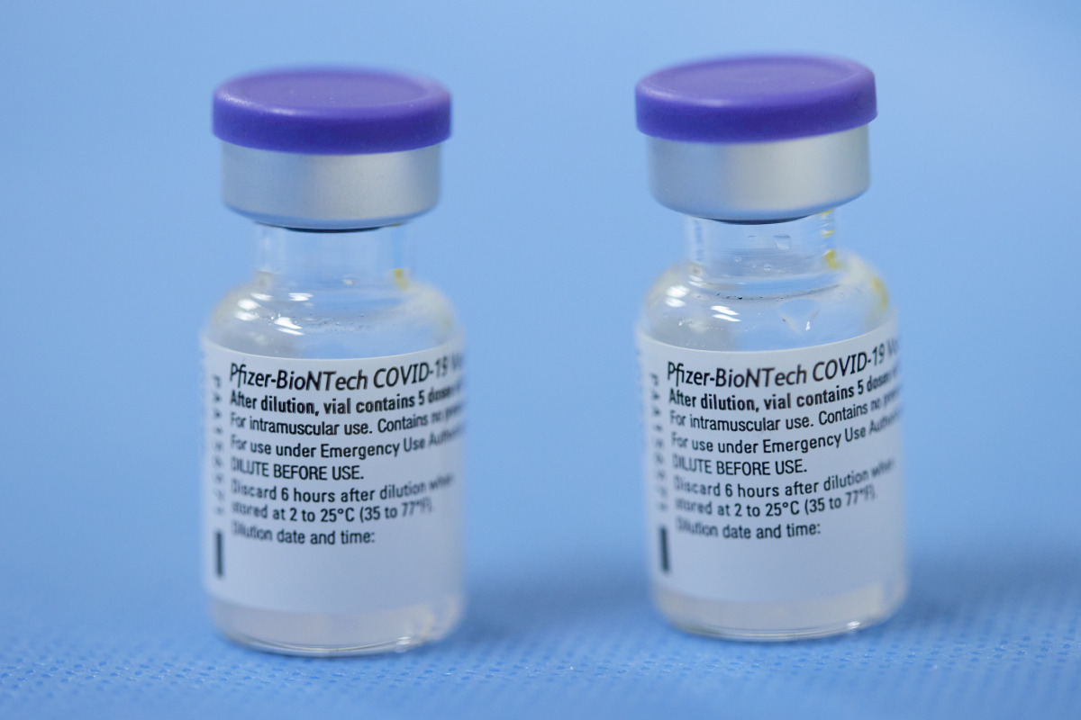 FILE PHOTO: Vials of the Pfizer-BioNTech vaccine are pictured in a vaccination centre in Geneva, Switzerland, February 3, 2021. REUTERS/Denis Balibouse/File Photo
