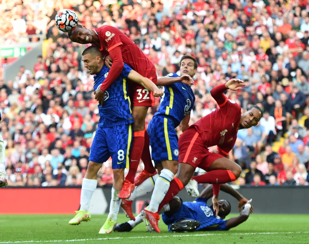 Liverpool's Joel Matip in action with Chelsea's Mateo Kovacic REUTERS/Peter Powell