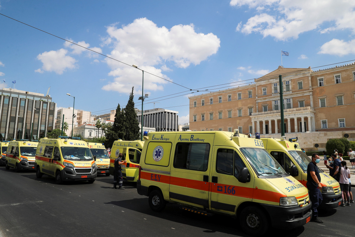Ambulances are seen outside the parliament building during a protest over mandatory vaccinations and the indefinite suspension for those working in the health care sector that have not had at least one shot of the vaccine, in Athens, Greece September 2, 2