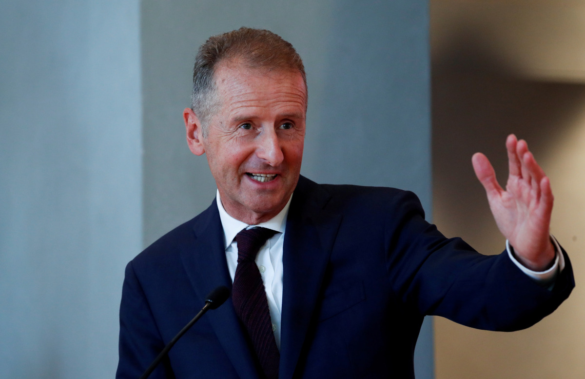 FILE PHOTO: Volkswagen Group Chief Executive Officer Herbert Diess gestures as he speaks during a news conference in Barcelona, Spain September 23, 2020. REUTERS/Albert Gea/File Photo
