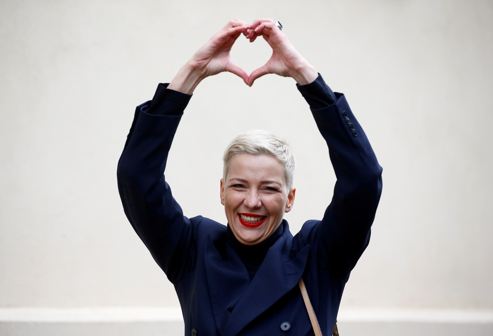 FILE PHOTO: Belarusian opposition politician Maria Kolesnikova makes a heart shape with her hands as she arrives for questioning at the Investigative Committee in Minsk, Belarus August 27, 2020. REUTERS/Vasily Fedosenko