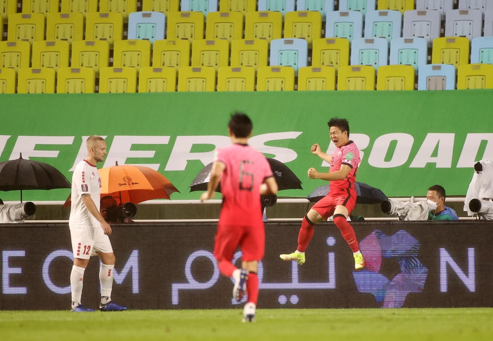 South Korea's Chang-Hoon Kwon celebrates scoring their first goal REUTERS/Kim Hong-Ji