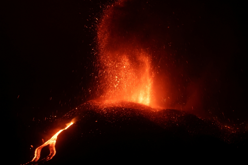 Lava flows following the eruption of a volcano on the Island of La Palma, in Los Llanos de Aridane, Spain September 21, 2021. REUTERS/Nacho Doce