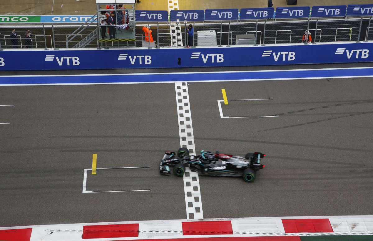 Mercedes' Lewis Hamilton crosses the line to win the race REUTERS/Anton Vaganov

