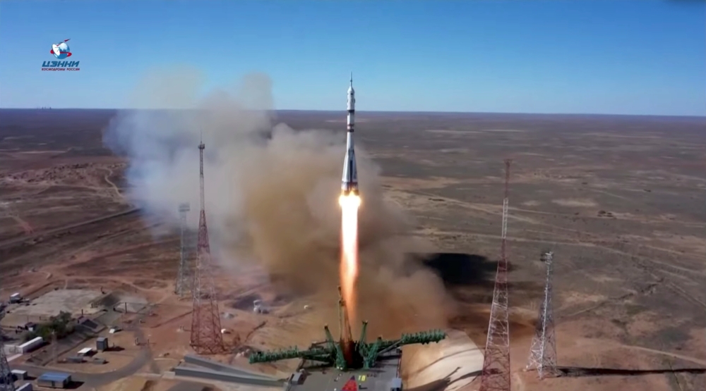 The Soyuz MS-19 spacecraft carrying the crew, formed of Russian cosmonaut Anton Shkaplerov, film director Klim Shipenko and actress Yulia Peresild, blasts off to the International Space Station (ISS) from the launchpad at the Baikonur Cosmodrome, Kazakhst