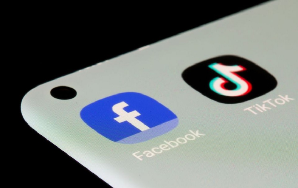 Facebook, TikTok apps are seen on a smartphone in this illustration taken, July 13, 2021. REUTERS/Dado Ruvic/Illustration
