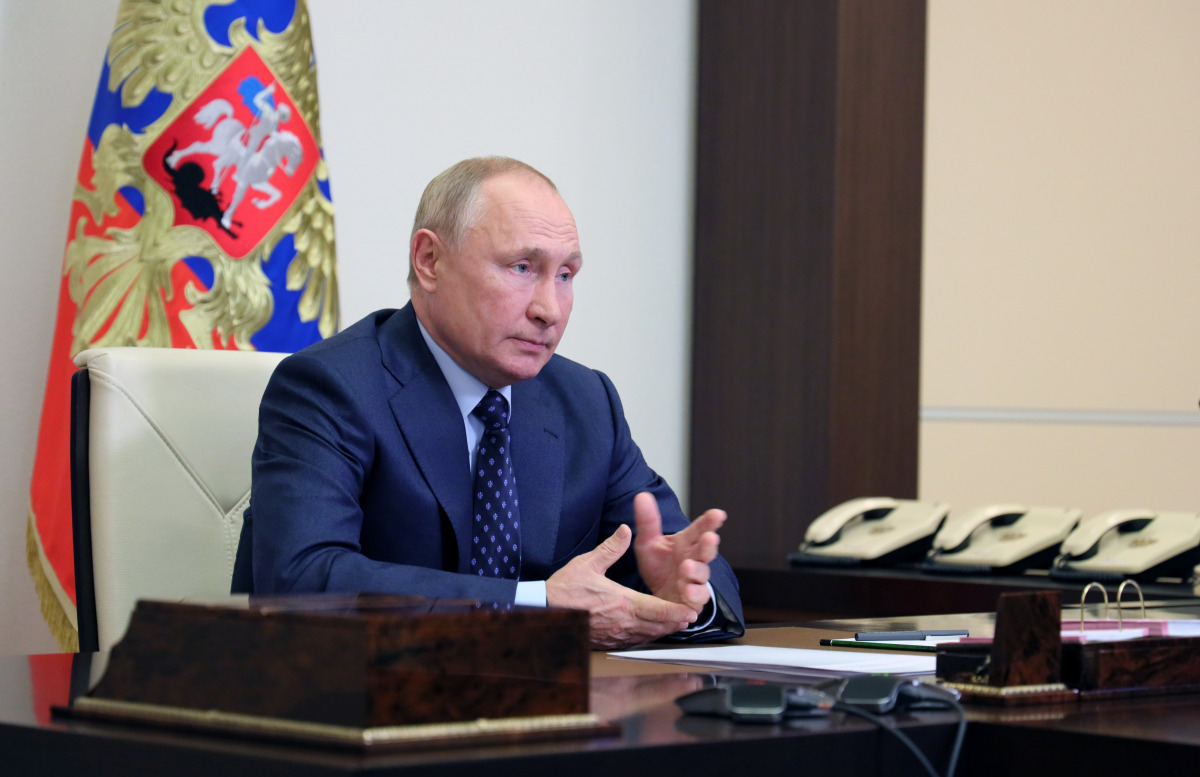Russian President Vladimir Putin attends a meeting with members of the Security Council via a video link at his residence outside Moscow, Russia October 11, 2021. Sputnik/Evgeniy Paulin/Kremlin via REUTERS