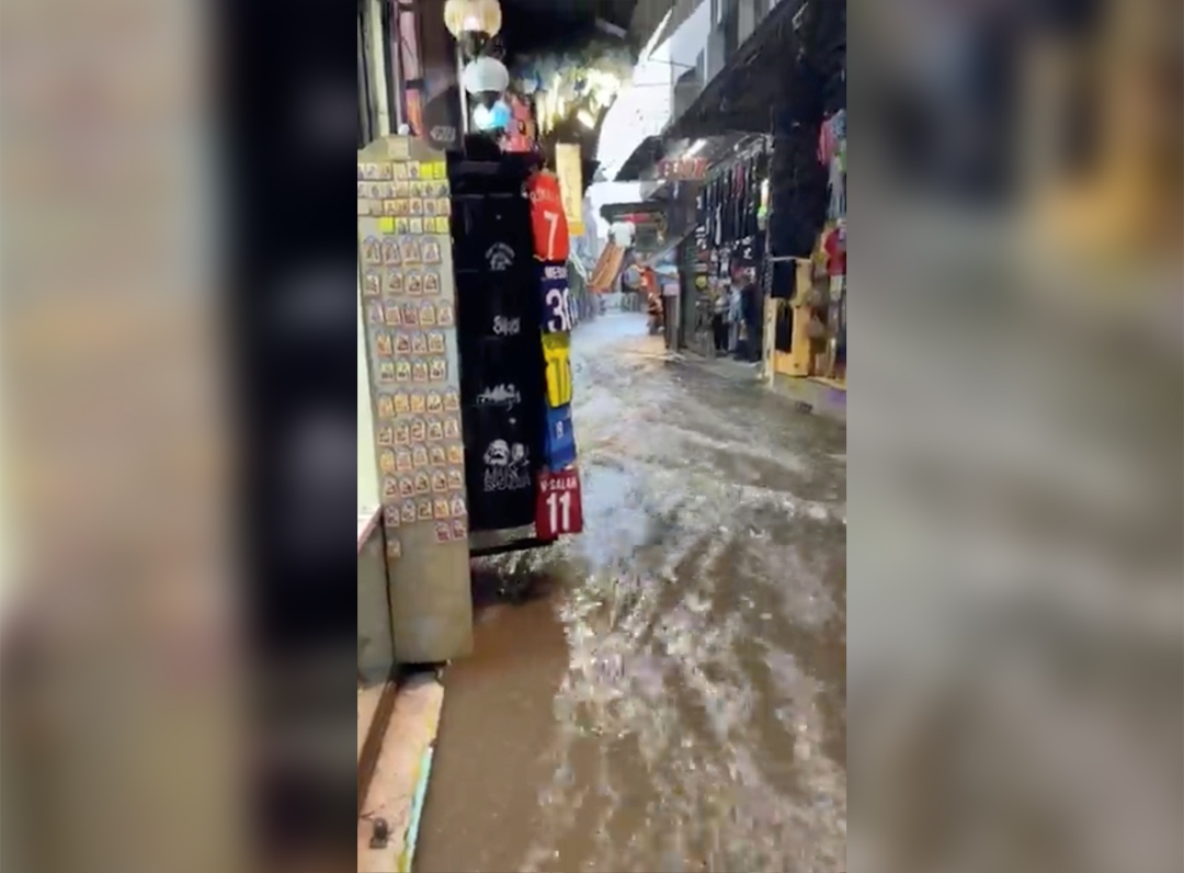 A general view of a flooded street in Athens, Greece October 14, 2021 in this still image obtained from a social media video. STRATOS JENKE/via REUTERS