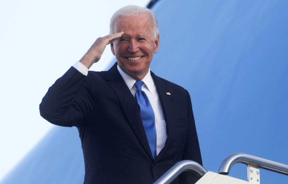 US President Joe Biden salutes as he boards Air Force One for travel back to Washington from Bradley International Airport in Windsor Locks, Connecticut, US. Reuters/Leah Millis