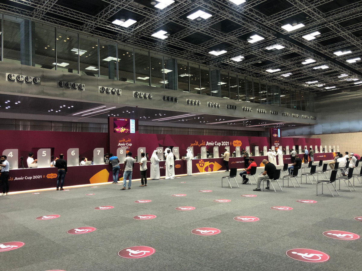 Fans collecting their ID from QNCC. Pic: Shammas Kalathil / The Peninsula