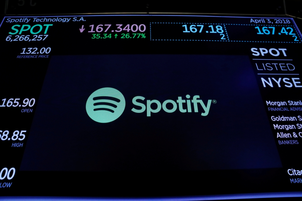 The Spotify logo is displayed after the stock began selling as a direct listing on the floor of the New York Stock Exchange in New York, US, April 3, 2018. Reuters/Lucas Jackson/File Photo