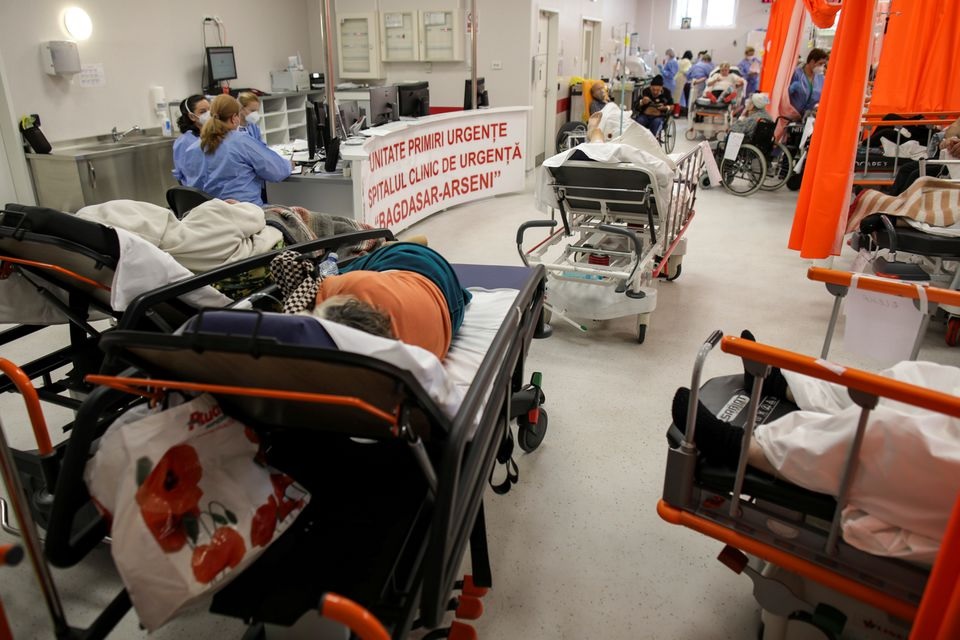 Medical professionals assist coronavirus disease (COVID-19) patients in the overcrowded intensive care unit at the Emergency Hospital 