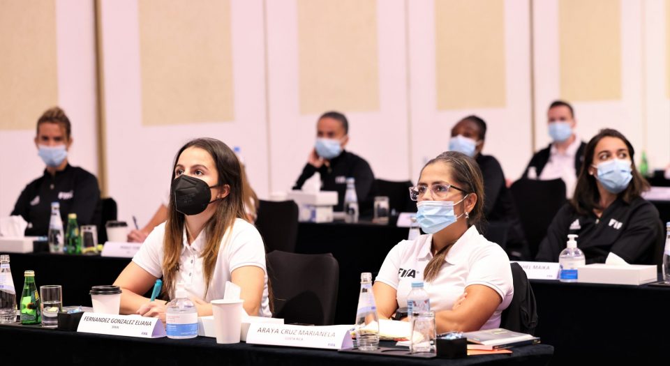 Women's referees attend the workshop.