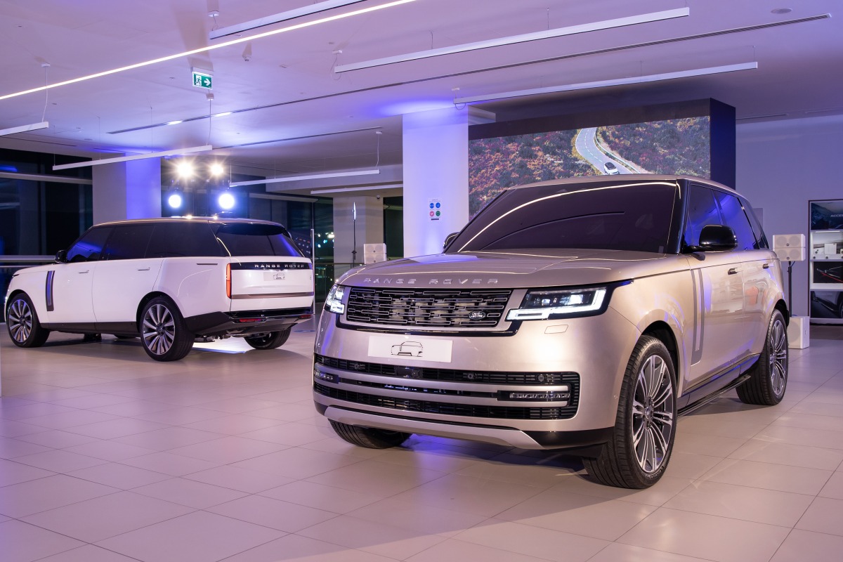 Omar Hussain Alfardan, President and CEO of Alfardan Group, Samer Bou Dargham, General Manager of Alfardan Premier Motors, and Bruce Robertson, Managing Director of Jaguar Land Rover Mena, and other VIPs during the new Range Rover launch in Doha, recently. 