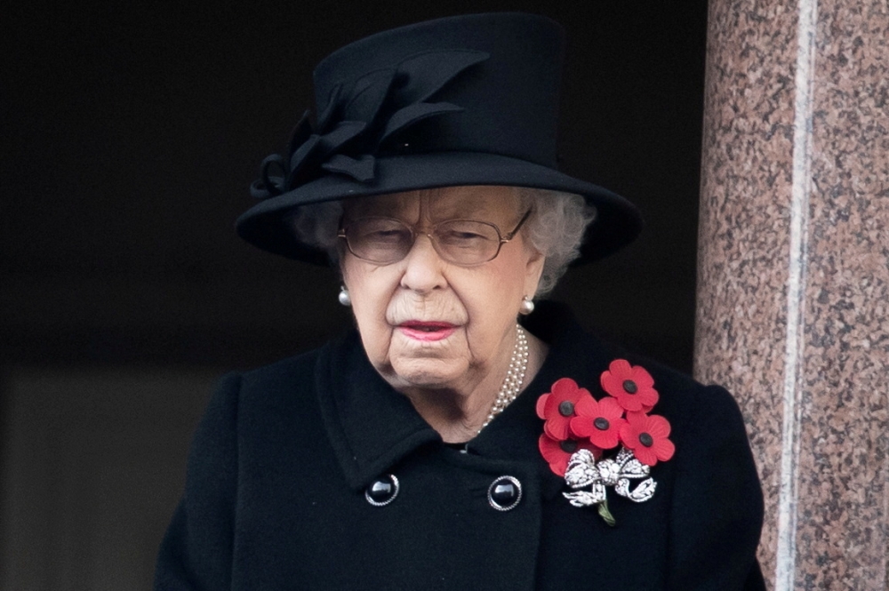 Britain's Queen Elizabeth attends the National Service of Remembrance at The Cenotaph on Whitehall in London, Britain November 8, 2020. Aaron Chown/PA Wire/Pool via REUTERS/File Photo