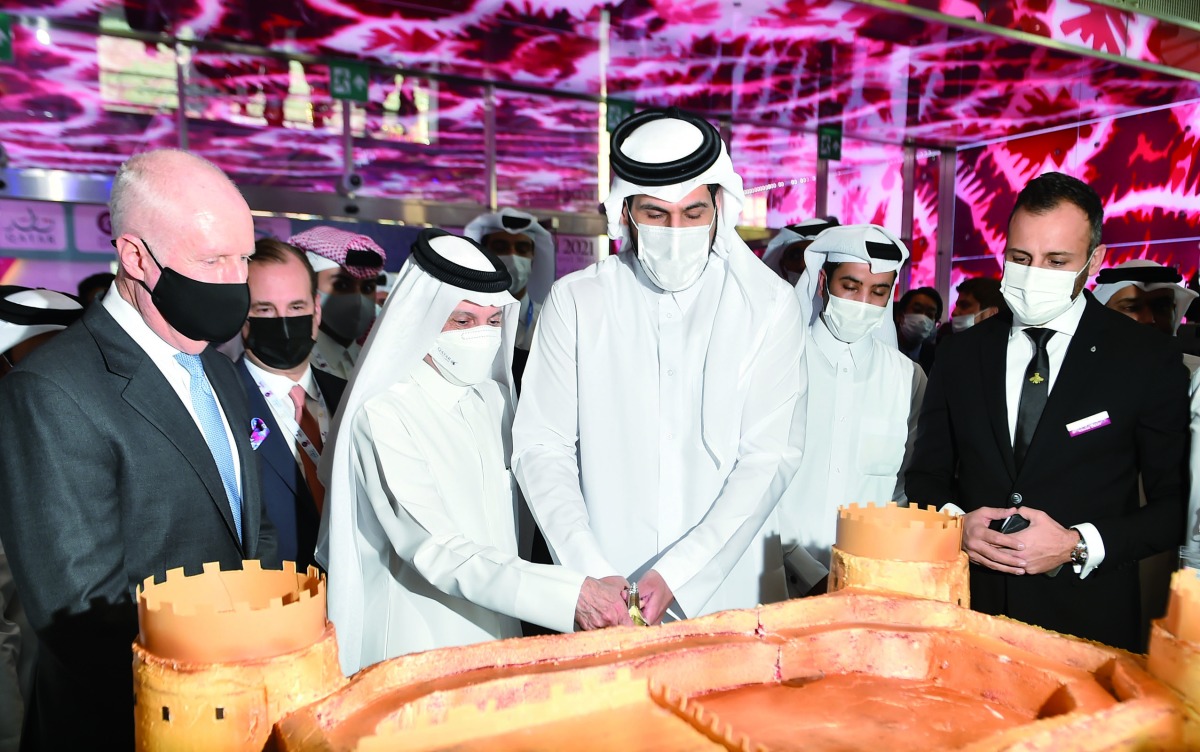 Minister of Commerce and Industry H E Sheikh Mohammed bin Hamad bin Qassim Al Abdullah Al Thani inaugurating the Qatar Travel Mart (QTM) 2021, at DECC, yesterday. Also seen is Chairman of Qatar Tourism and Qatar Airways Group Chief Executive, H E Akbar Al Baker. Pic: Abdul Basit / The Peninsula 
