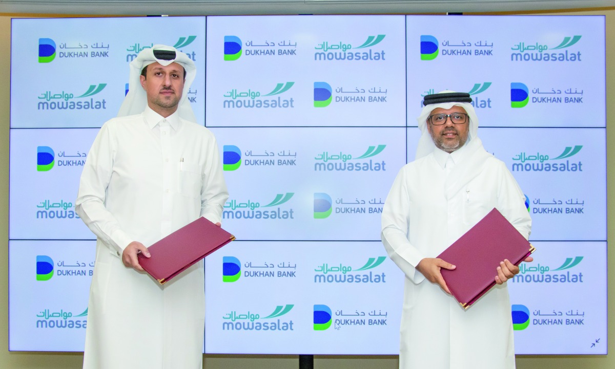 Talal Ahmed Al Khaja, Chief Marketing & Communications Officer at Dukhan Bank (left) and Ahmed Al Muftah, CAO at Mowasalat (Karwa) during the launch of the initiative in Doha.