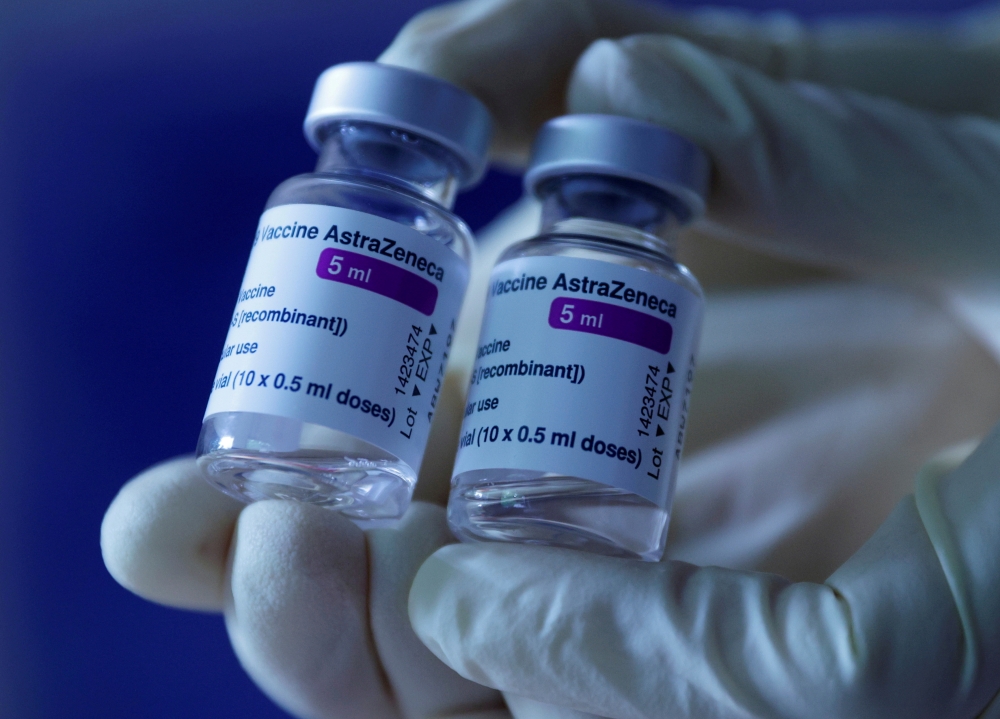 A doctor shows vials of AstraZeneca's COVID-19 vaccine in his general practice facility, as the spread of the coronavirus disease (COVID-19) continues, in Vienna, Austria May 13, 2021. REUTERS/Leonhard Foeger/File Photo