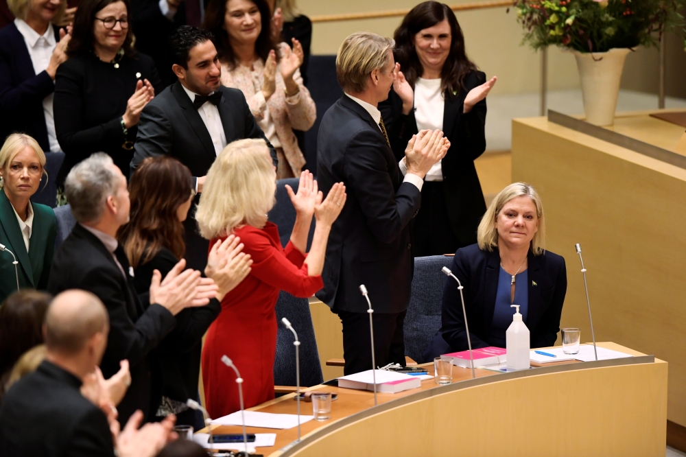 Current Finance Minister and Social Democrat leader Magdalena Andersson is congratulated after being appointed as the country's new Prime Minister following voting at the Swedish Parliament Riksdagen in Stockholm, Sweden November 24, 2021. Erik Simander /TT News Agency/via Reuters