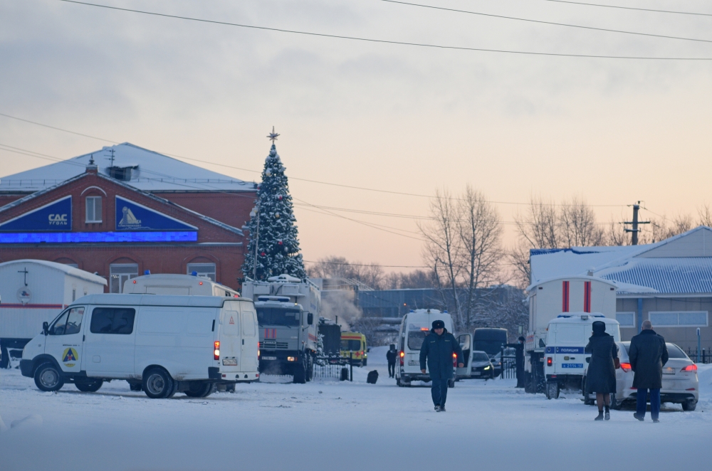 Vehicles of Russian emergency services are seen at the mine territory following an accident at the Listvyazhnaya coal mine in the Kemerovo region, Russia, November 26, 2021. REUTERS/Alexander Patrin