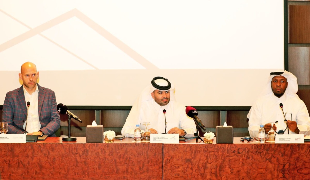 Chief Marketing Officer at Aspire Zone Foundation Mohamed Mubarak Al Kuwari (centre), Board member of Qatar Volleyball Association Saeed Salem Al Jumaani (right) and CEO of Sportworx Wilco Nijland during the press conference.