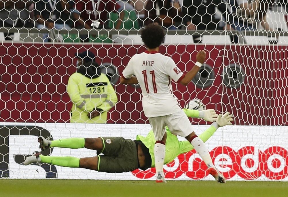 December 3, 2021 Qatar's Akram Afif scores their first goal from the penalty spot REUTERS/Amr Abdallah Dalsh