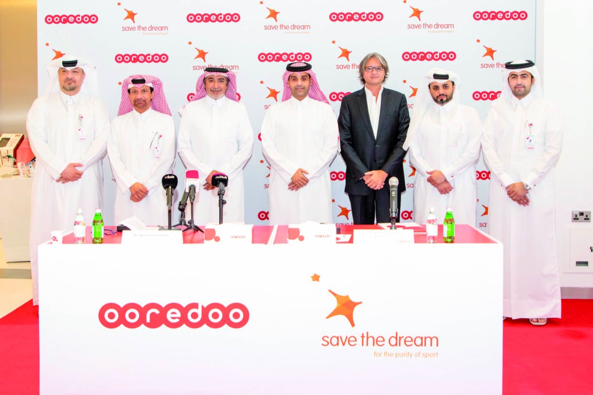 CEO at Ooredoo Sheikh Mohammed bin Abdulla Al Thani; ICSS Founder and Chairman Mohammed Hanzab and other officials during the event held at Ooredoo Tower, West Bay, yesterday.