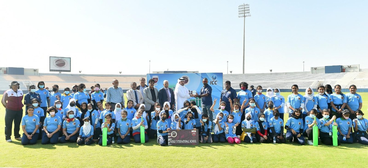 Qatar Cricket Association officials with coaches and participants of the Criiio Entry Level Programme Criiio Entry Level Programme at Asian Town Cricket Stadium.