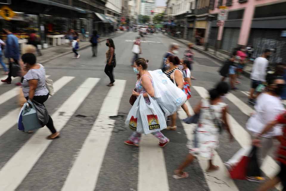 (File picture) People walk in a popular shopping street before Christmas, amid the coronavirus disease (COVID-19) outbreak, in Rio de Janeiro, Brazil, December 23, 2020. REUTERS.